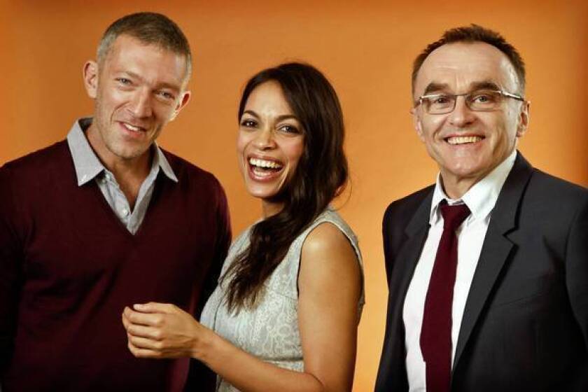 Vincent Cassel, left, Rosario Dawson and Danny Boyle at the Four Seasons Hotel in Beverly Hills.