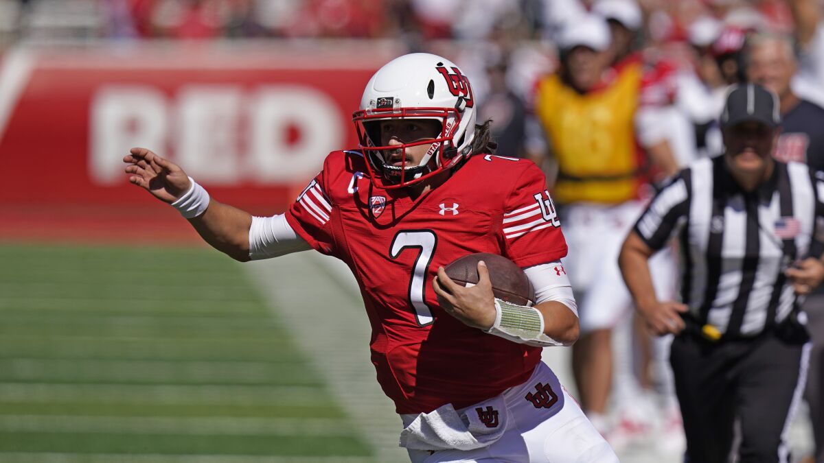 Utah quarterback Cameron Rising carries the ball during a win over Oregon State on Oct. 1.