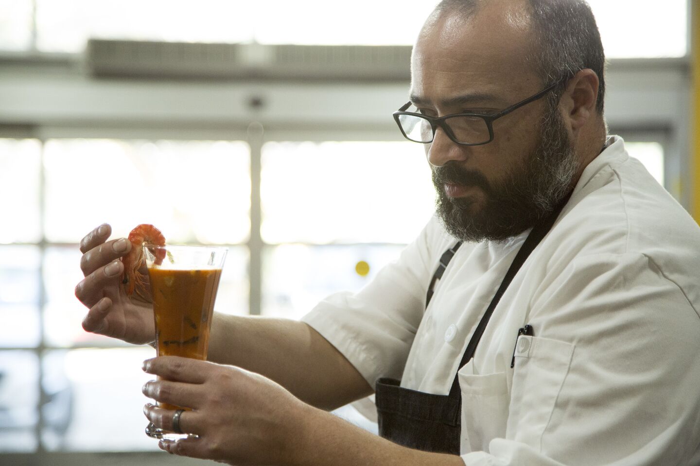 Chef Gilberto Cetina Jr. assembles a cocktail at Holbox.