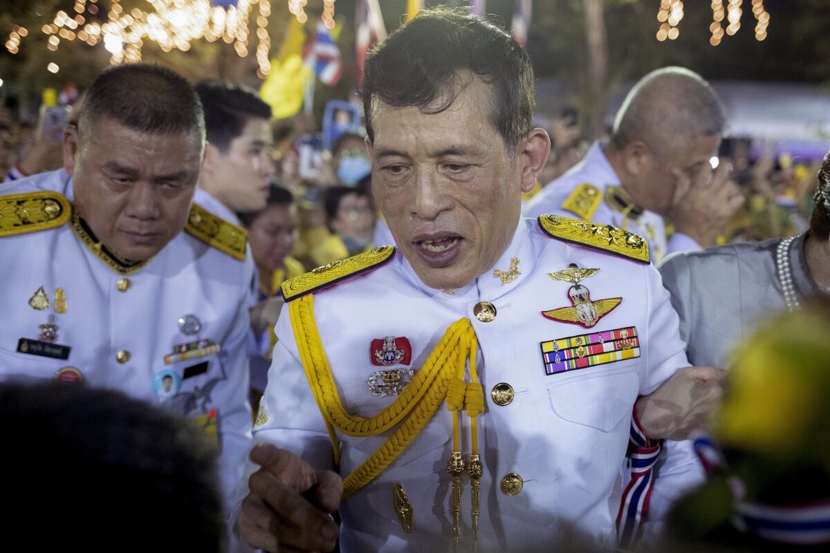 Thai King Maha Vajiralongkorn speaks with supporters in Bangkok