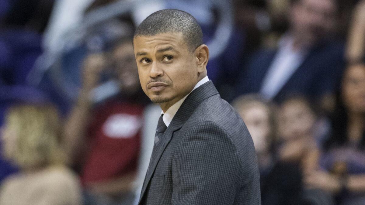 Earl Watson watches the Phoenix Suns take on the Portland Trail Blazers in October 2017 during his tenure as Suns coach. Watson is in the running for the UCLA basketball coaching job.