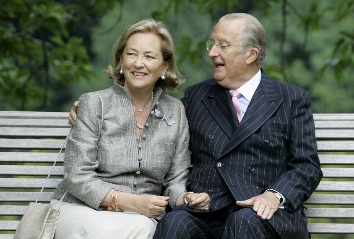 FILE - In this Tuesday, July 17, 2008 file photo, Belgium's Queen Paola and King Albert II pose for photographers at the Royal Palace in Laeken, Belgium. Artist and sculptor Delphine Boel is on the cusp of officially becoming a Belgian princess after a Brussels court on Thursday, Oct. 1, 2020 ruled in her favor in a decades-old royal paternity scandal pitting her against former King Albert II. (AP PhotoVirginia Mayo, File)