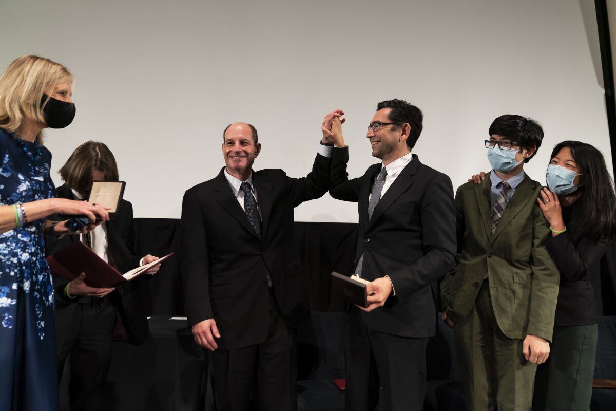 David Julius, center left, and Ardem Patapoutian, Nobel Prize recipients in physiology or medicine