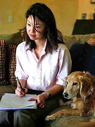 Dr. Karen Sueda, L.A.'s only veterinary behaviorist, meets with a client joined by one of the client's dogs. One of the client's dogs (not the one pictured) has acute separation anxiety, and has been known to tear up the house as well as injure herself.