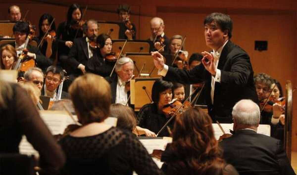 Alan Gilbert leads the New York Philharmonic at a concert at Walt Disney Concert Hall in May.