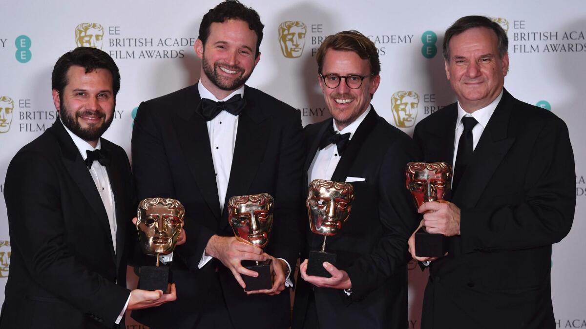 Special visual effects editors, from left, Adam Valdez, Dan Lemmon, Andrew R. Jones and Robert Legato with their awards for Special Visual Effects for their work on the film 'The Jungle Book' at the BAFTA British Academy Film Awards in London on Feb. 12.