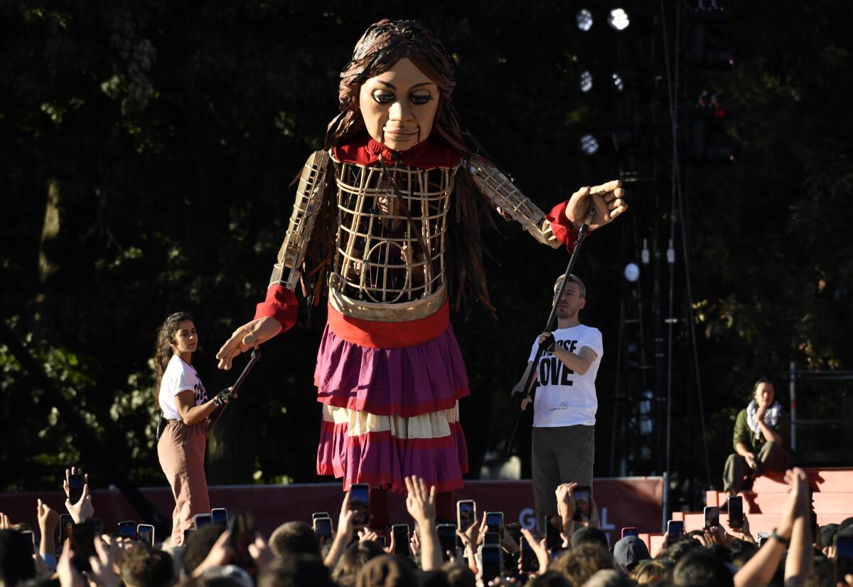 Little Amal, a 12-foot puppet representing a 10-year-old refugee from Syria, will make its ArtPower debut this season.