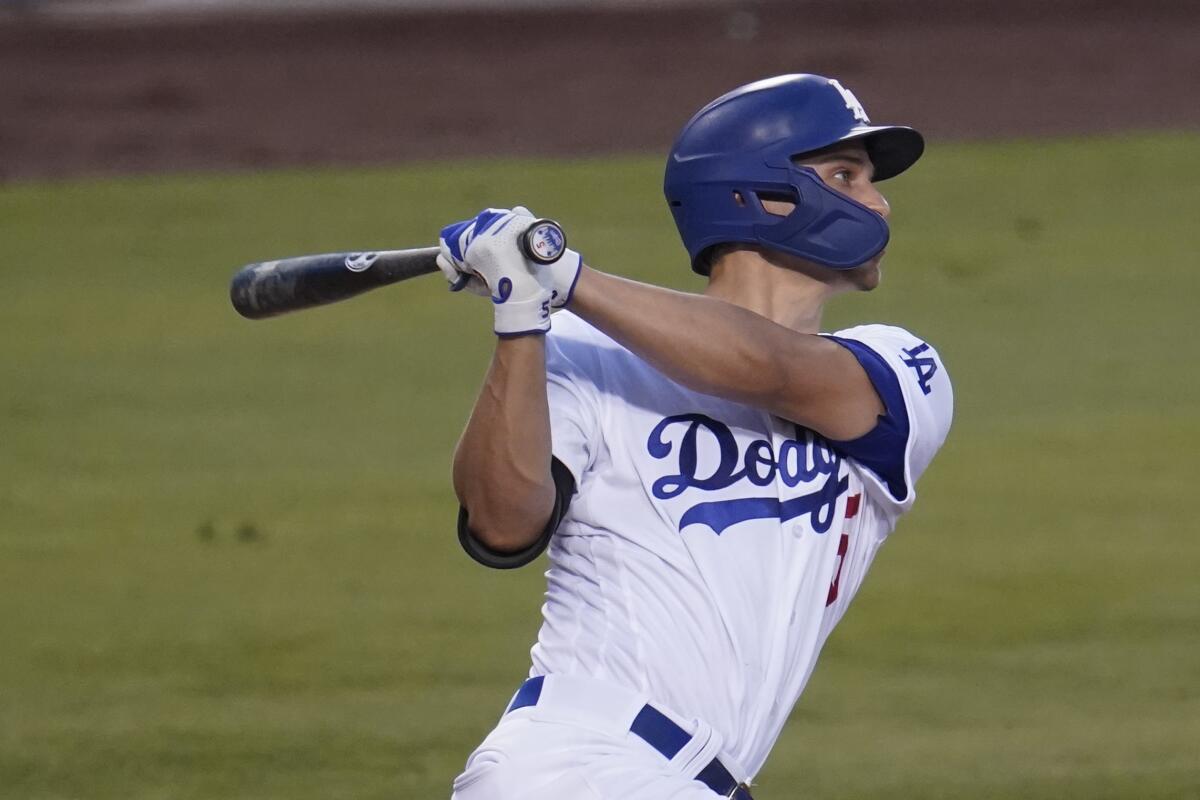 Dodgers shortstop Corey Seager follows through on a three-run home run during the second inning.