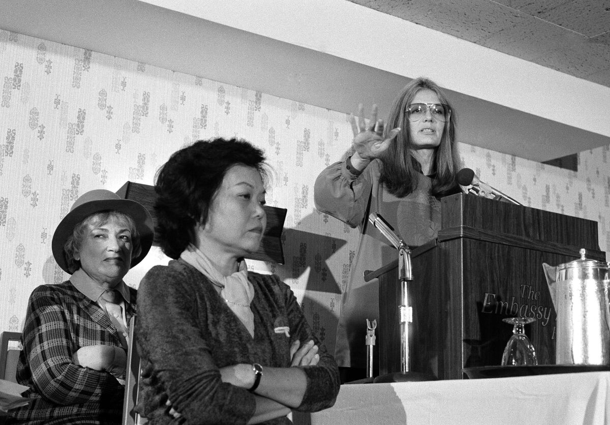 Bella Abzug and Patsy Mink of Women USA sit next to Gloria Steinem in 1979.