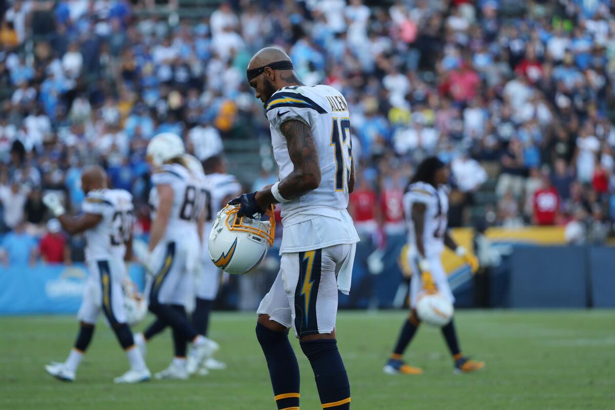 Chargers wide receiver Keenan Allen walks off the field at the end of a 27-20 loss to the Houston Texans on Sunday.