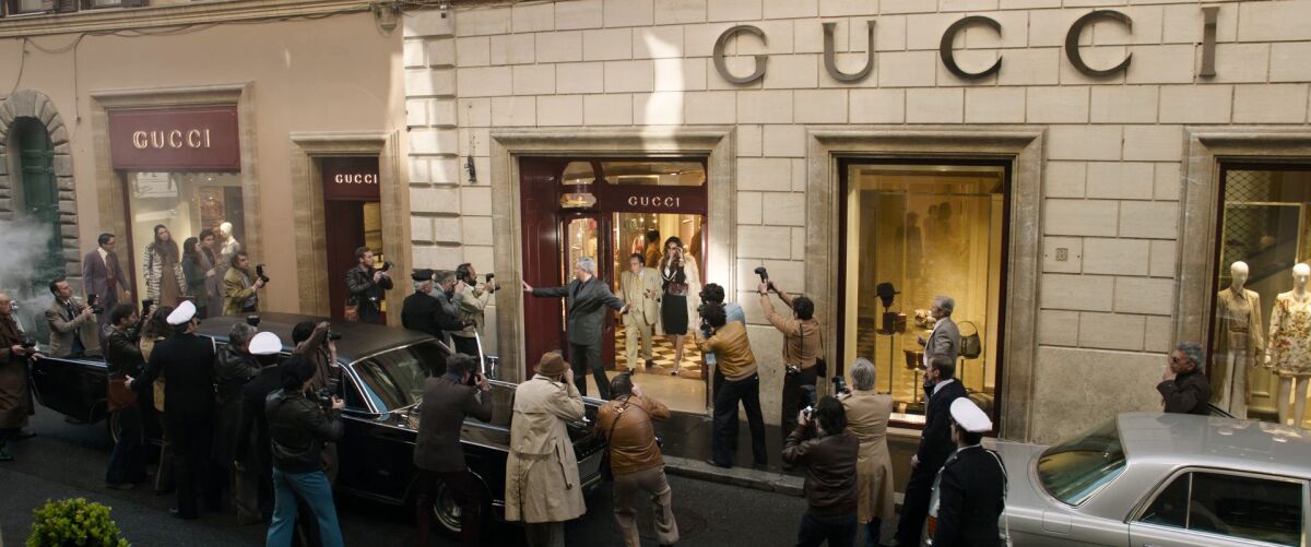 A "House of Gucci" scene set in front of the New York store.