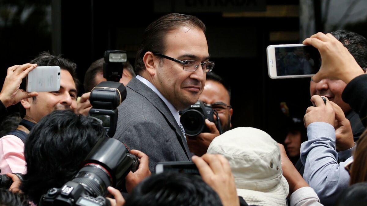 Former Veracruz Gov. Javier Duarte, seen in a file photo, has disappeared, and a 15 million pesos reward has been offered for information leading to his arrest.