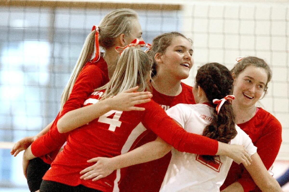 Burroughs High's girls' volleyball team rallied past Burbank on Thursday.