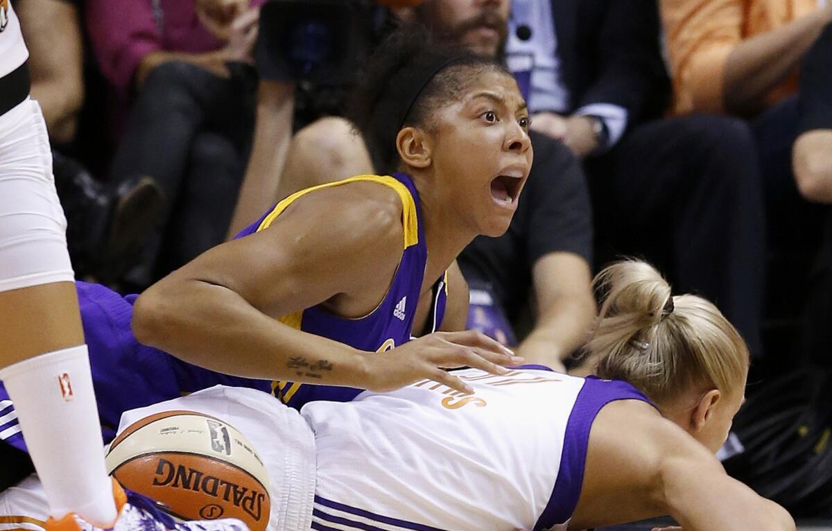 Candace Parker reacts after getting called for a foul on Phoenix's Erin Phillips during the second half of the Sparks' 93-68 loss to the Mercury. The Sparks were eliminated from the WNBA playoffs by the Mercury.