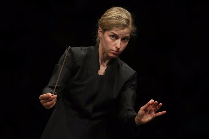 HOLLYWOOD, CALIF. - AUG. 8, 2017. The Los Angeles Philharmonic performs under the direction of conductor Karina Canellakis at the Hollywood Bowl on Tuesday, Aug. 8, 2017. (Luis Sinco/Los Angeles Times)