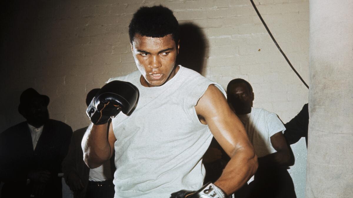 Muhammad Ali trains in London in 1966.