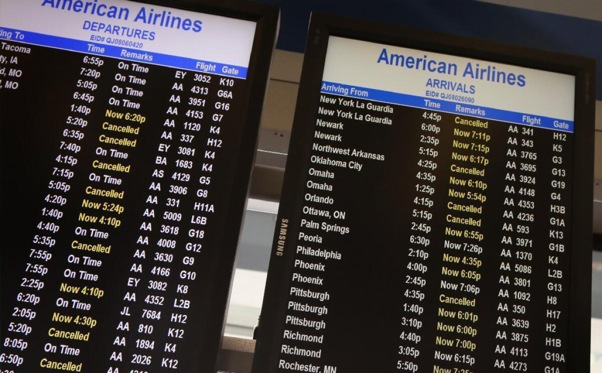 American Airlines' computer problem grounded thousands of passengers Tuesday. The airline says it is fixed. Passengers, however, will need strategies for rebooking.