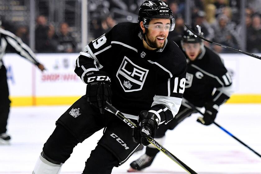 LOS ANGELES, CA - NOVEMBER 22: Alex Iafallo #19 of the Los Angeles Kings leads a rush with Dustin Brown #23 and Anze Kopitar #11 during the second period against the Winnipeg Jets at Staples Center on November 22, 2017 in Los Angeles, California. (Photo by Harry How/Getty Images) ** OUTS - ELSENT, FPG, CM - OUTS * NM, PH, VA if sourced by CT, LA or MoD **