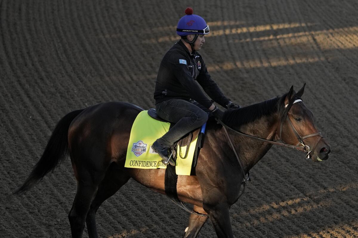 Kentucky Derby hopeful Confidence Game works out at Churchill Downs on Wednesday.