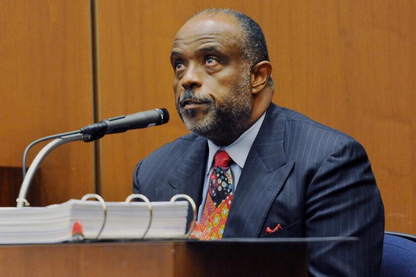 State Sen. Roderick Wright (D-Inglewood) takes the stand during his perjury and voter fraud trial at Los Angeles Superior Court on Jan. 16. Wright has been convicted in a perjury and voter fraud case.
