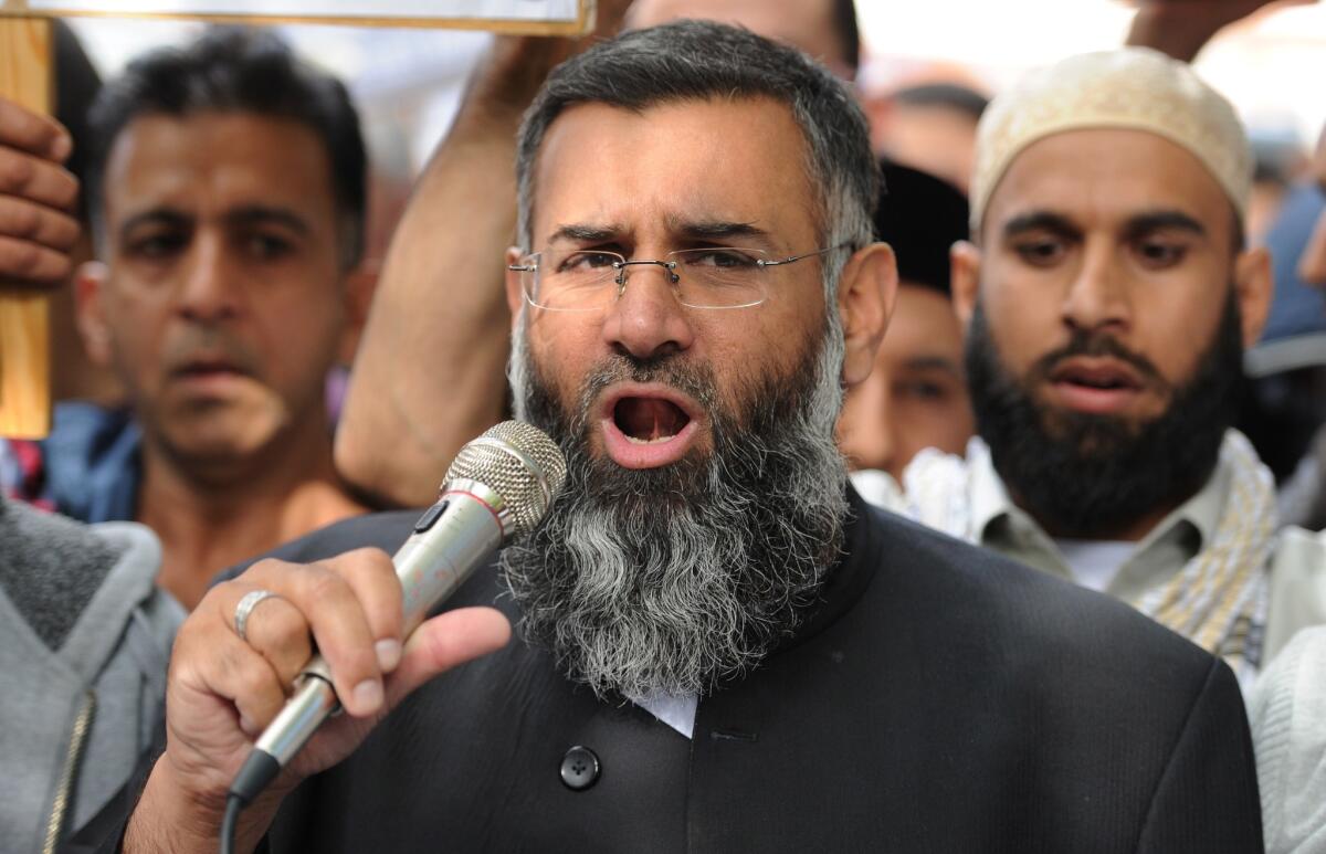 Islamist preacher Anjem Choudary speaks in 2012 to a group of demonstrators in London protesting against a film they considered insulting to Islam.