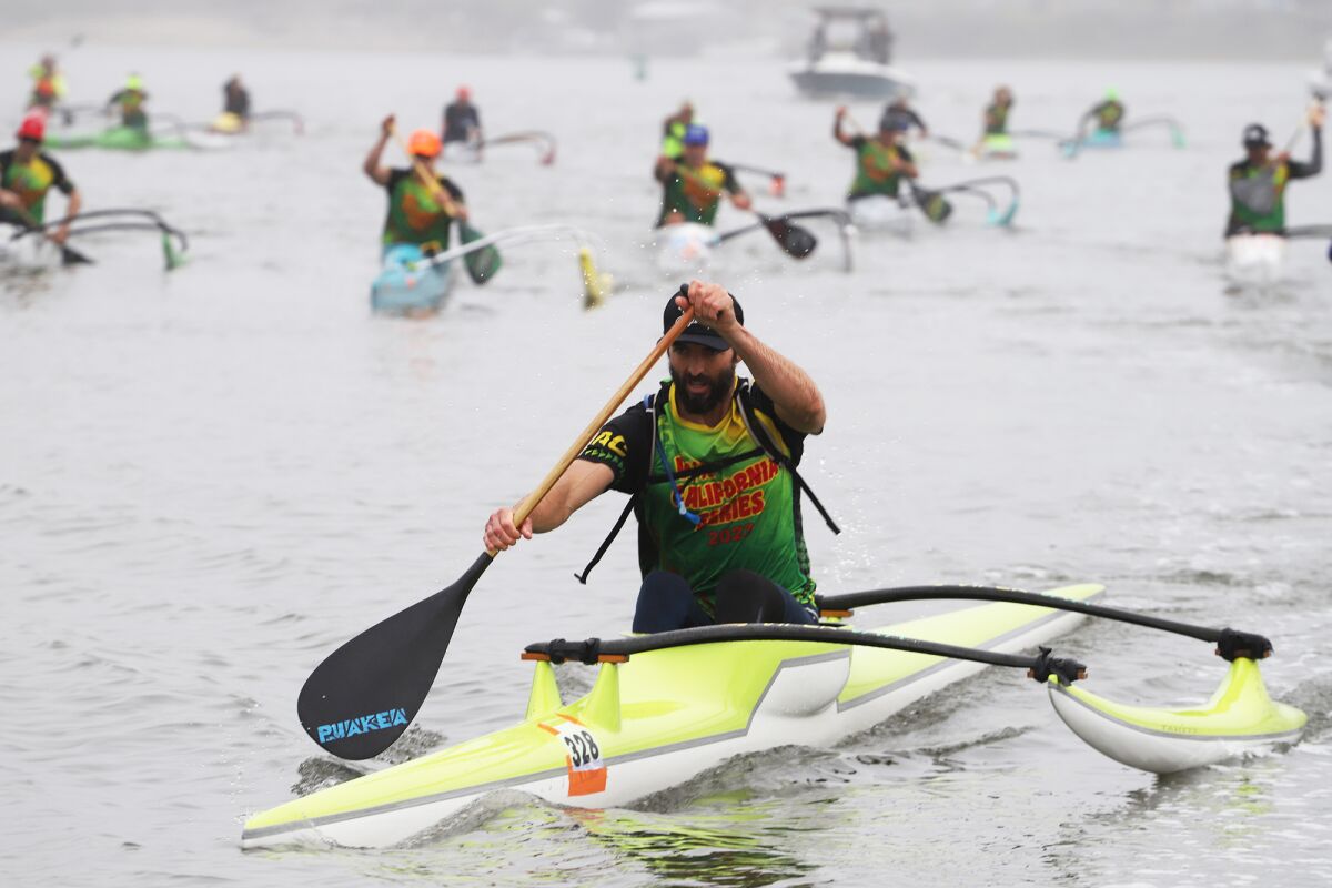 Brent Campbell, of Newport Beach, takes the lead during the Outrigger Canoe V1 qualifying race.