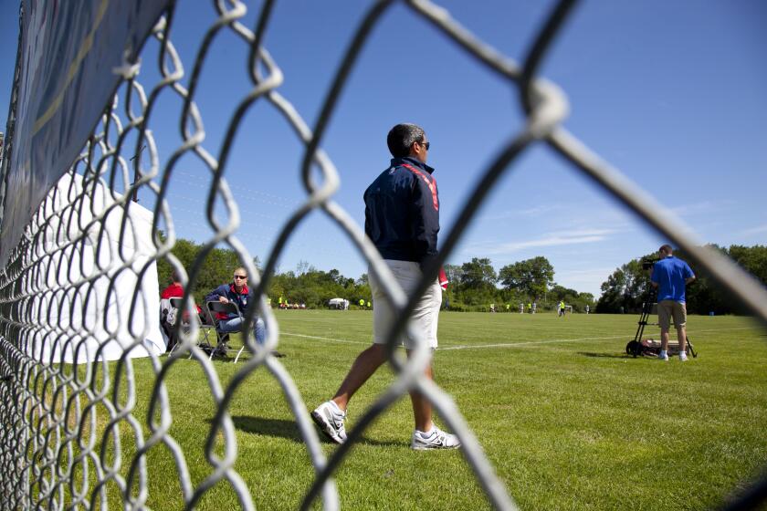 ADVANCE FOR WEEKENDS JULY 17-18, 2011 - In this July 13, 2011 photo, Claudio Reyna, U.S. Soccer Youth Director, watches a game of U-17 and 18 players at the U.S. Soccer Development academy in Milwaukee. The former World Cup captain believes changes he's making to U.S youth development guidelines will improve the way young players learn the game. (AP Photo/Jeffrey Phelps)