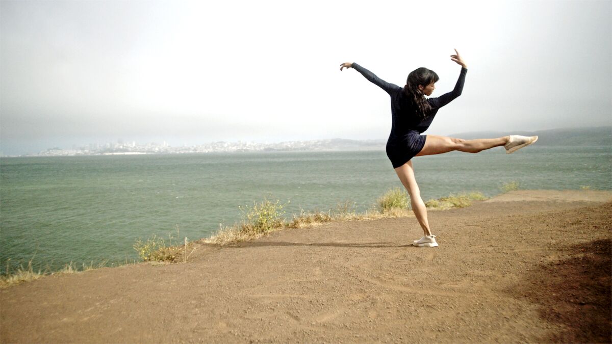 Frances Chung dances on a cliff overlooking a bay in Benjamin Millepied's "Dance of Dreams."
