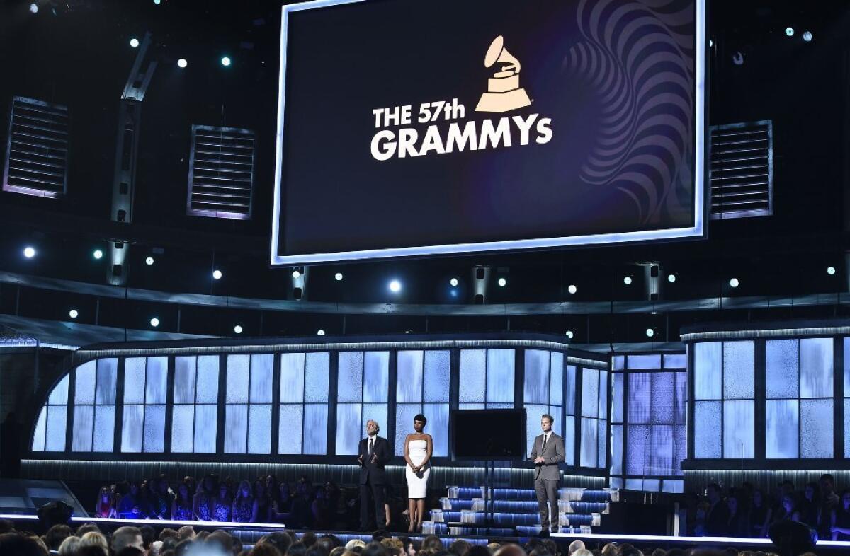 President of the Recording Academy Neil Portnow (left), Jennifer Hudson and Ryan Tedder are on stage at the 57th Annual Grammy Awards in Los Angeles on Sunday.