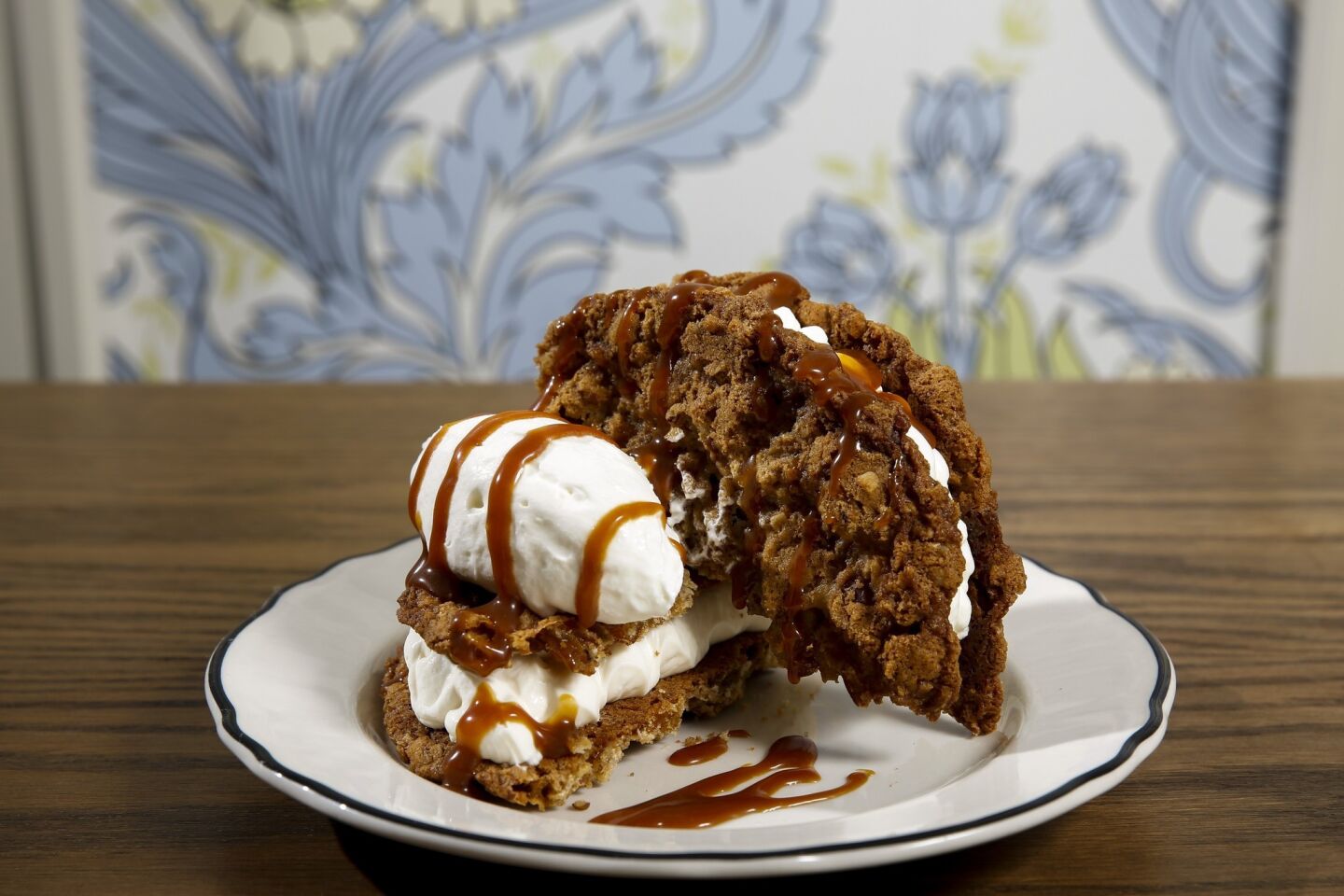 Crispy, chewy, golden raisin oatmeal cookie sandwich, with mascarpone filling, for $8.