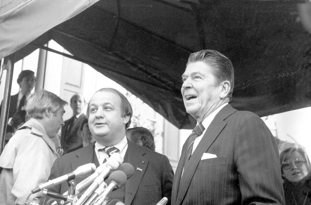 President-elect Ronald Reagan, pictured here in 1981, is seen introducing James Brady as his press secretary.