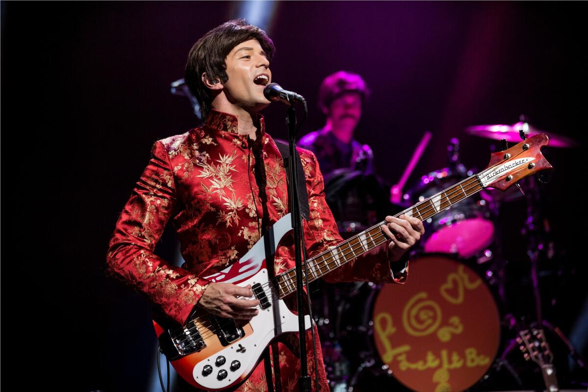 James Fox, as Paul McCartney, performing "Magical Mystery Tour" in the rock musical "Let It Be" at the St. James Theater in New York.