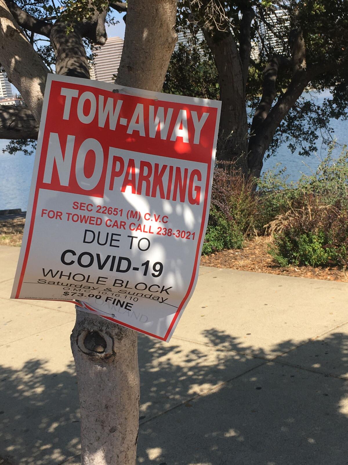 A sign warns motorists away from Lake Merritt in Oakland.