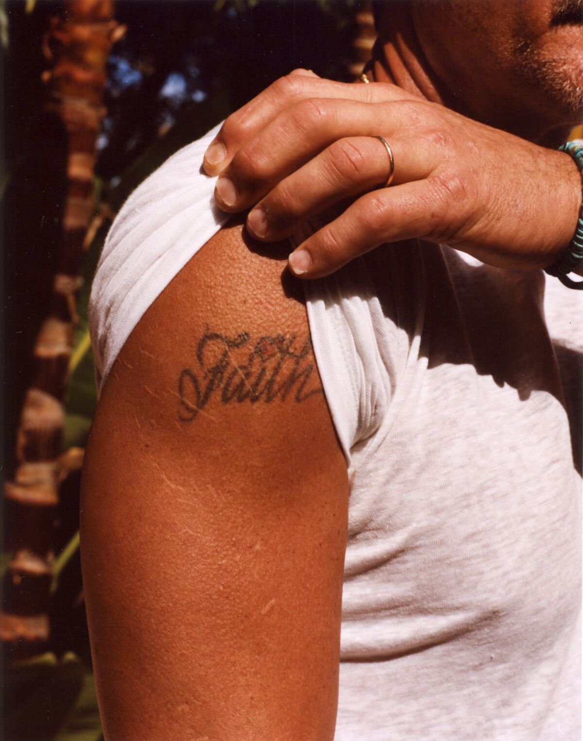 McGraw's tattoo of Faith Hill's name on his shoulder.