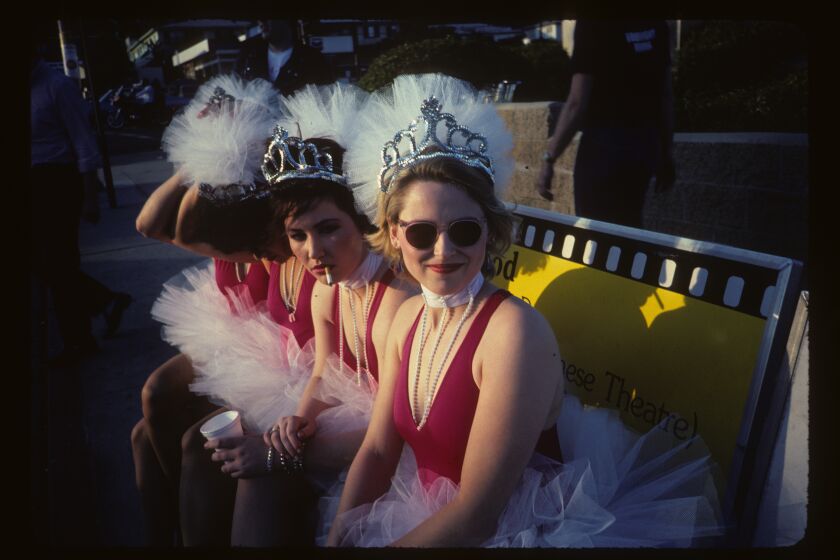 From left, the Go-Go's Charlotte Caffey (face not visible), Jane Wiedlin (head down), Charlotte Caffey (with cigarette) and Gina Schock (in sunglasses) in 1982.