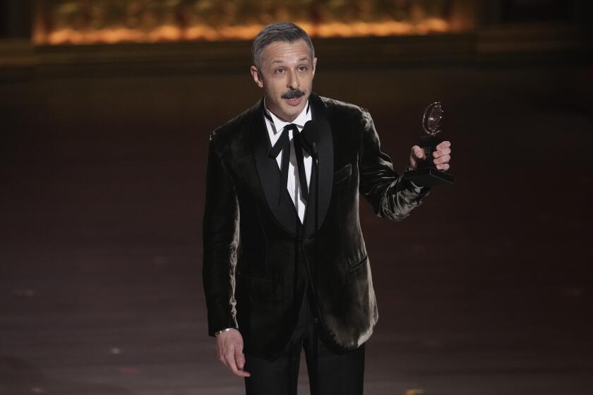 Jeremy Strong accepts the Tony Award for lead actor in a leading role in a play for "An Enemy of the People."