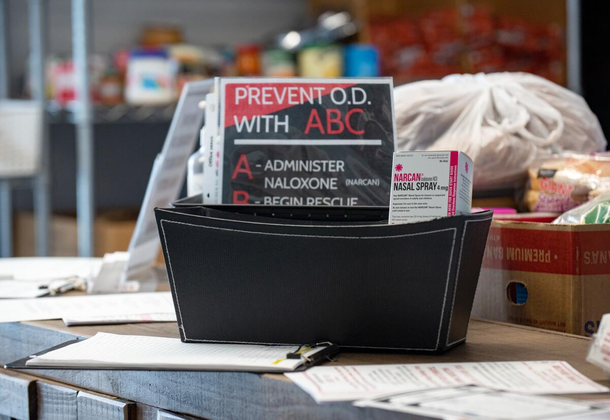 Narcan sits alongside groceries at the front counter Wednesday at Recovery Road in Anaheim. 