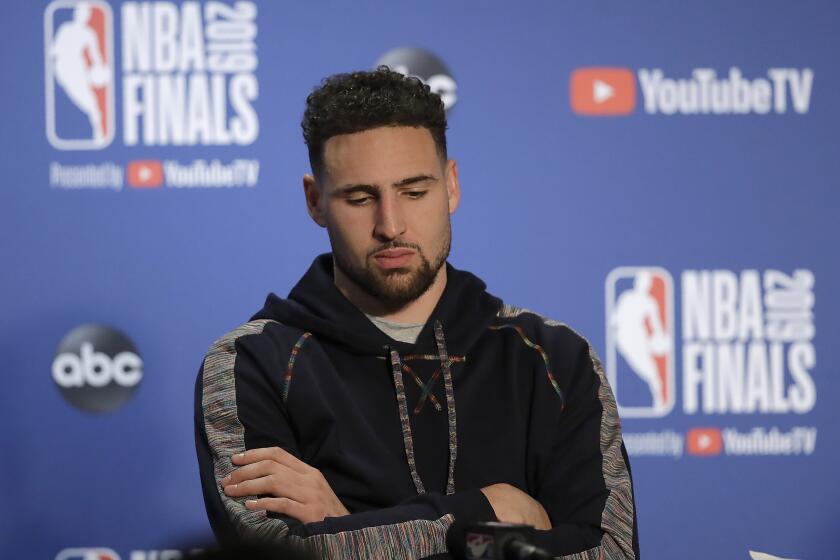 Golden State Warriors' Klay Thompson waits to speak during a media conference after Game 4 of basketball's NBA Finals against the Toronto Raptors Friday, June 7, 2019, in Oakland, Calif. (AP Photo/Ben Margot)