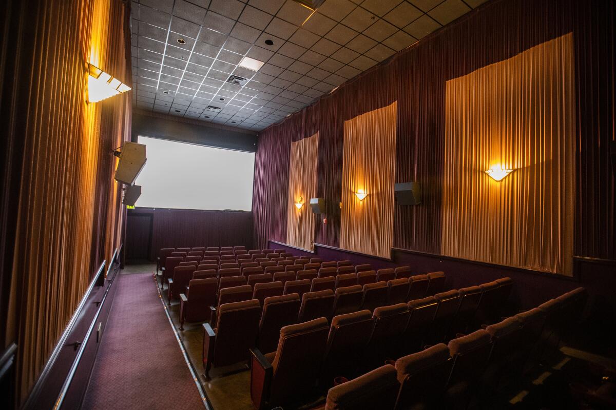 BEVERLY HILLS, CALIF. -- TUESDAY, DECEMBER 31, 2019: A view of one of the theaters at Lumiere Cinema at the Music Hall in Beverly Hills, Calif., on Dec. 31, 2019. Co-owners Peter Ambrosio, Lauren Brown and Luis Orellana, longtime Laemmle staffers, film fans and self-described “Los Angeles ‘film people,’” worked together at the Music Hall in Beverly Hills for five years. When there were rumors the theater might close, the trio hatched a plan and the Lumiere Cinema at the Music Hall was born. Now, they face the challenge of keeping an independent neighborhood art house alive in the age of Netflix and Disney blockbusters dominating the cinematic landscape. (Allen J. Schaben / Los Angeles Times)