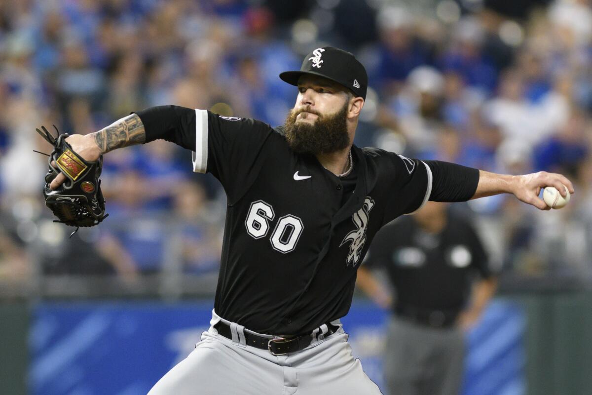 Chicago White Sox starting pitcher Dallas Keuchel throws to a Kansas City Royals batter during the second inning of a baseball game, Friday, Sept. 3, 2021, in Kansas City, Mo. (AP Photo/Reed Hoffmann)