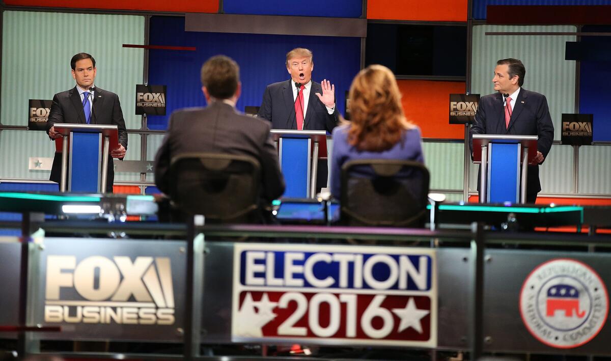 Marco Rubio, left, Donald Trump and Ted Cruz take part in the Republican debate in North Charleston, S.C.