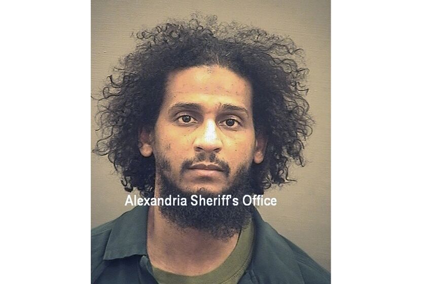 FILE - In this photo provided by the Alexandria Sheriff's Office is El Shafee Elsheikh who is in custody at the Alexandria Adult Detention Center, Wednesday, Oct. 7, 2020, in Alexandria, Va. The British national was sentenced to life in prison on Friday, Aug. 19, 2022 for his role in an Islamic State hostage-taking scheme. Roughly two dozen Westerners were taken captive a decade ago by a notorious group of masked captors nicknamed “The Beatles” for their British accents. El Shafee Elsheikh received his sentence Friday in an Alexandria, Va. courtroom. (Alexandria Sheriff's Office via AP)