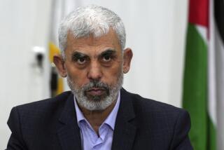 FILE - Yahya Sinwar chairs a meeting with leaders of Palestinian factions at his office in Gaza City, April 13, 2022. (AP Photo/Adel Hana, File)