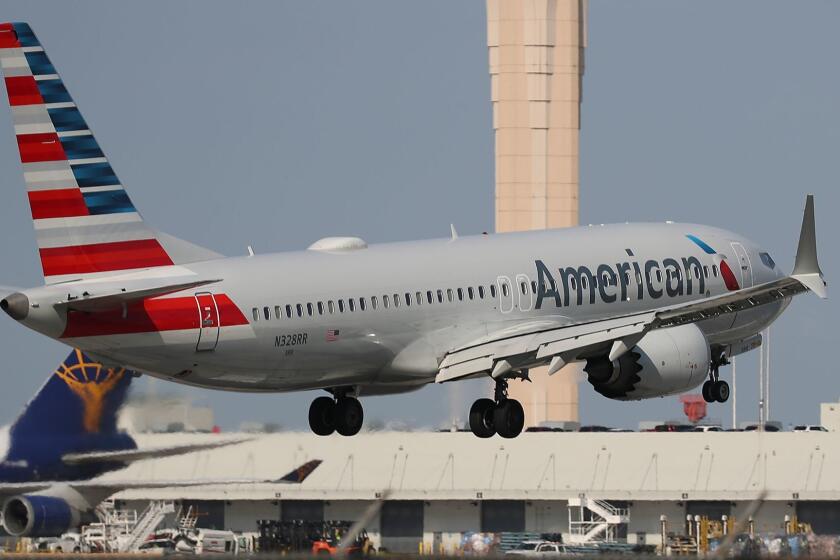 An American Airlines Boeing 737 Max 8 prepares to land at the Miami International Airport.