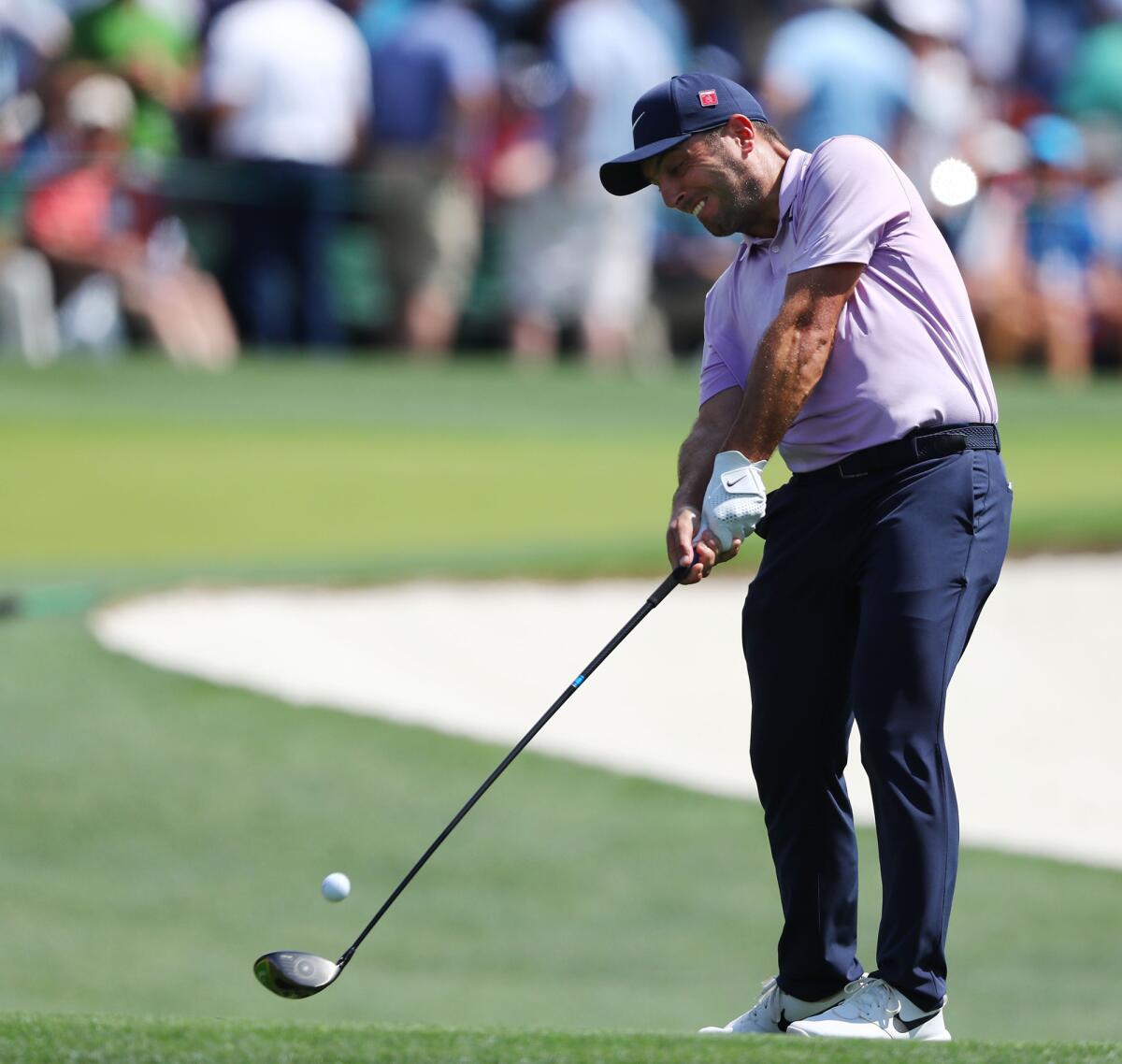 Francesco Molinari tees off on the 3rd hole during the third round of the Masters at Augusta National Golf Club in Augusta, Ga., on Saturday.