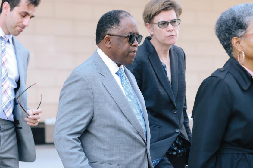 Los Angeles, CA - March 27: L.A. City Councilman Mark Ridley-Thomas leaves court for the day at the Federal Courthouse on Monday, March 27, 2023 in Los Angeles, CA. He is accused of steering lucrative county contracts to USC's social work school in exchange for a slate of benefits for his son. (Dania Maxwell / Los Angeles Times).