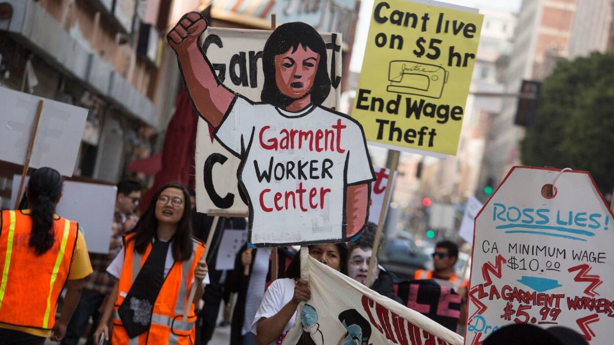 Garment workers rally in downtown Los Angeles in 2016 to demand an end to wage theft