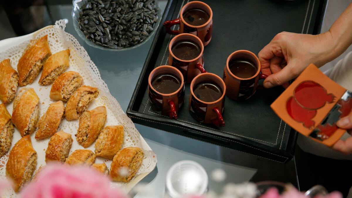 Turkish coffee is prepared with Georgian dessert during a home cooking class.