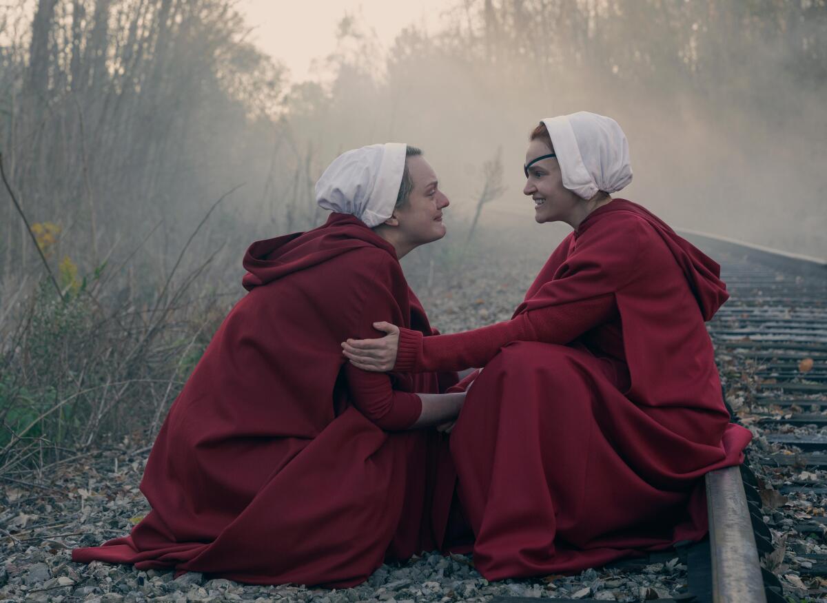 June (Elisabeth Moss) and Janine (Madeline Brewer) make their escape in "The Handmaid's Tale."