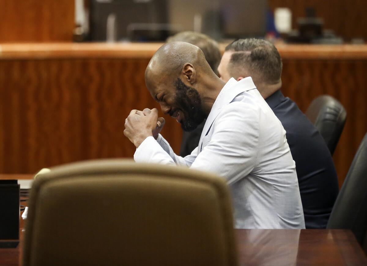 Andre Jackson reacts after the jury found him guilty of the fatal 2016 stabbing of 11-year-old Josue Flores at the Harris County Criminal Courthouse, Tuesday, May 3, 2022, in Houston. (Godofredo A. Vásquez/Houston Chronicle via AP)